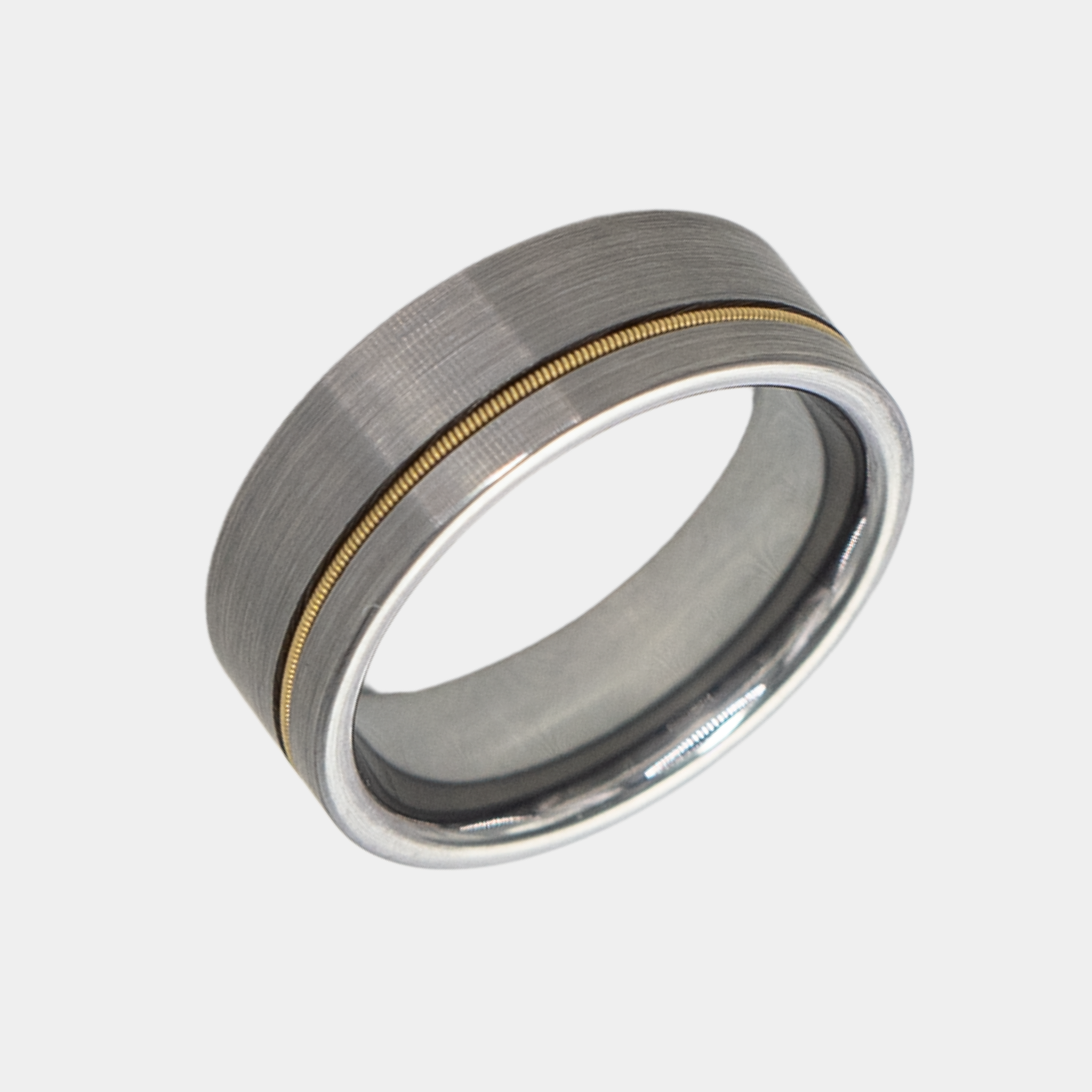 Orpheus ring – solid black diamond with polished beveled edges from the Hustler Collection. Angled view highlighting shape and finish.